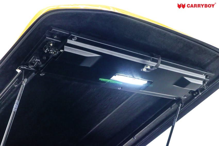Underside of the Sport Lid SV showing gas struts and the latch mechanism